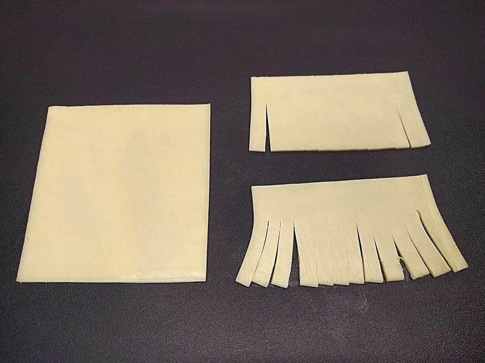 Loncha de queso Gouda cortada.