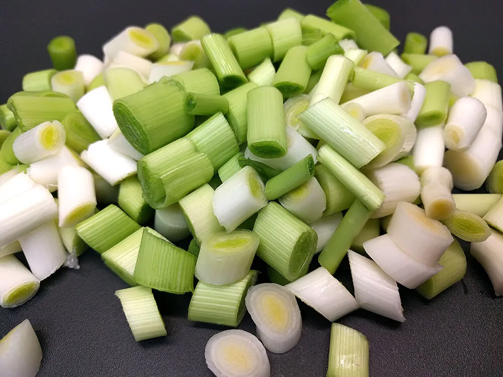 Ajos tiernos cortados