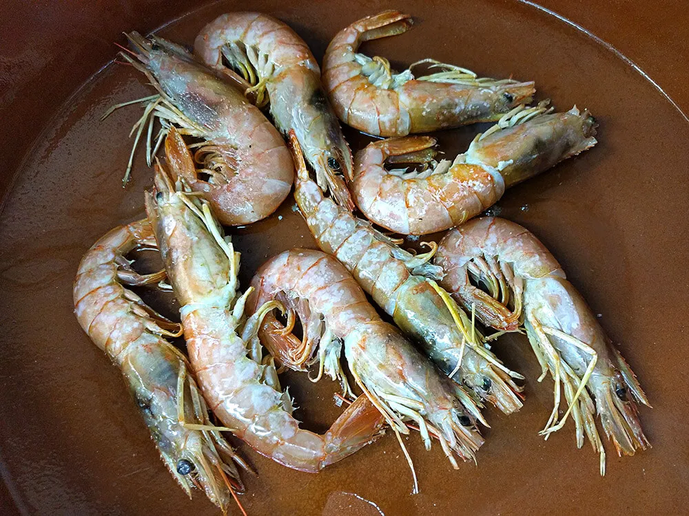Gambas con aceite de oliva.