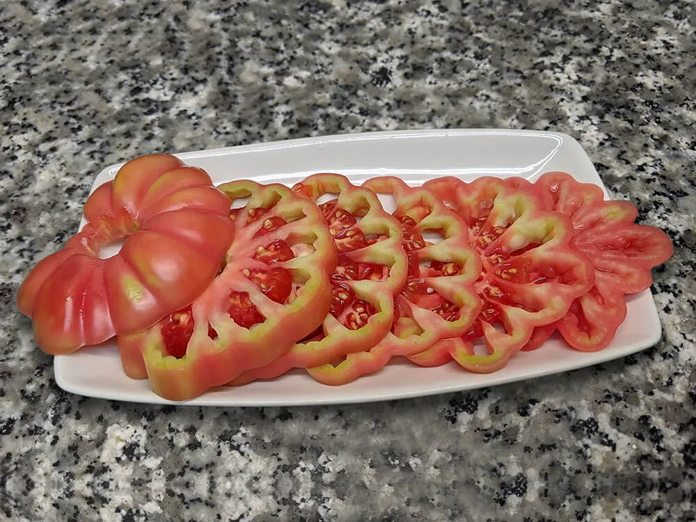 Tomate monterosa a rodajas.