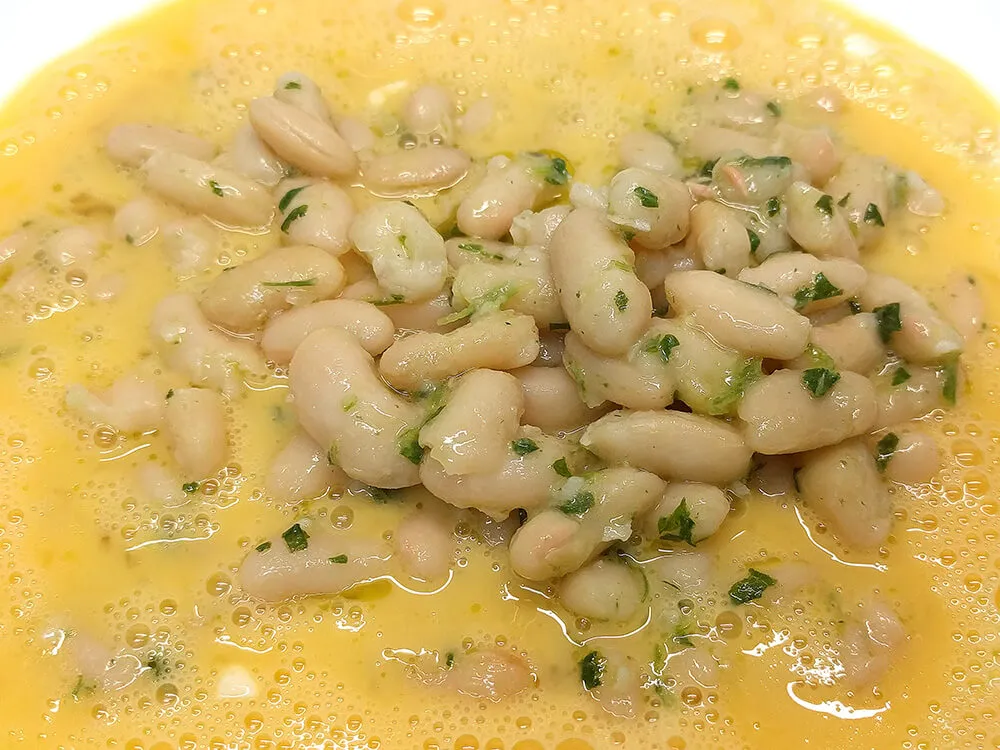 Huevo batido con las judías